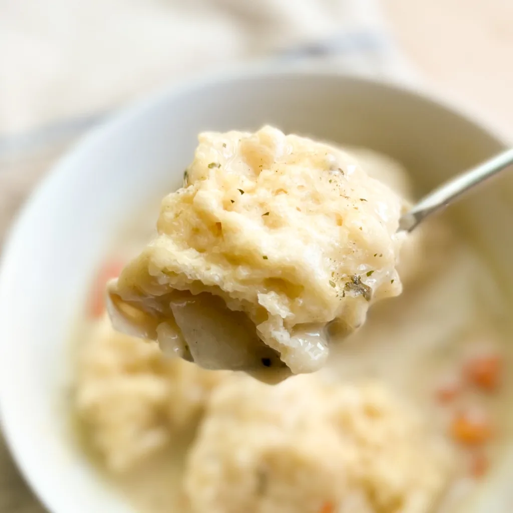 sourdough dumpling on a spoon