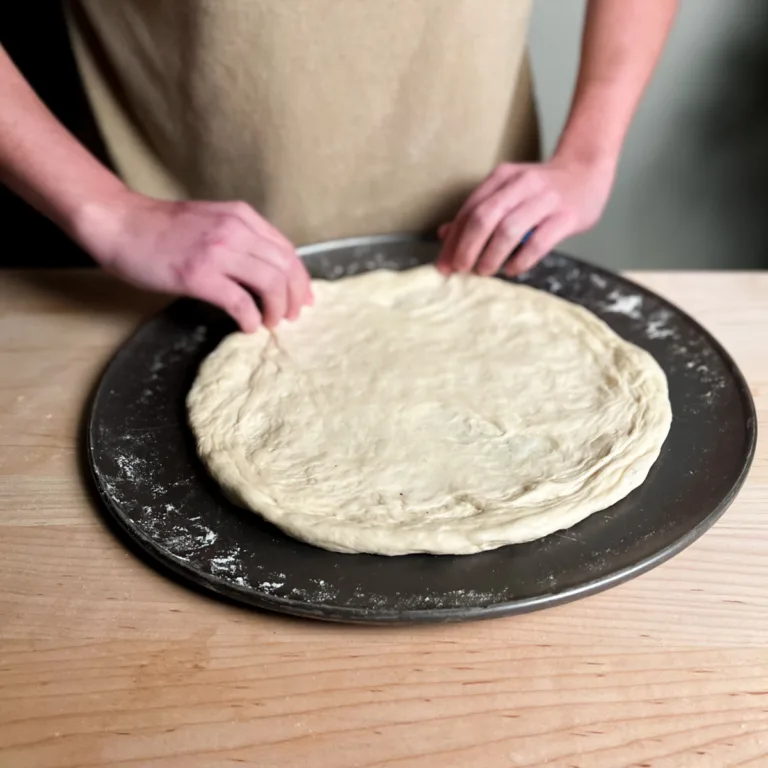 shaping sourdough pizza crust visual