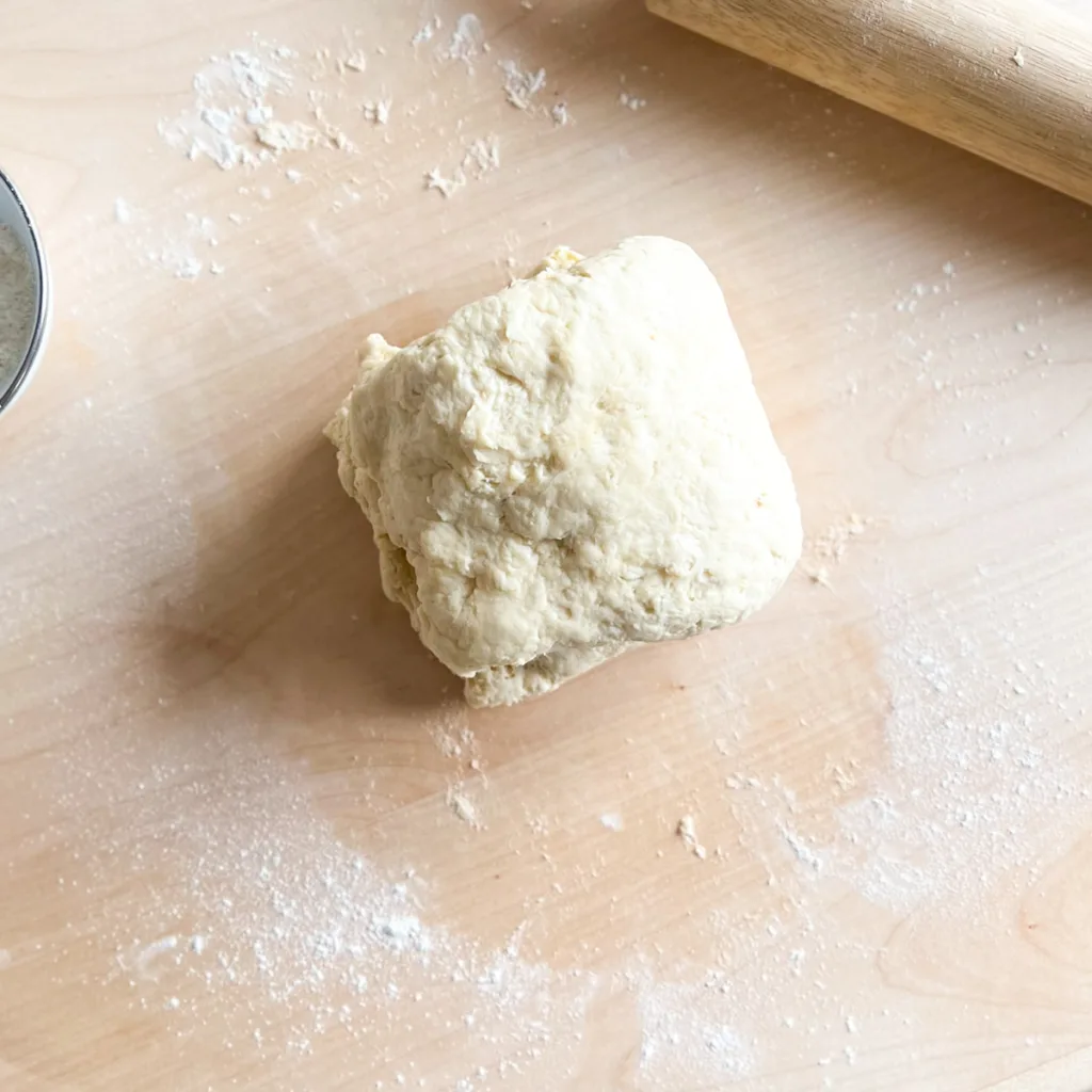 The biscuit dough after the sides have been folded in.