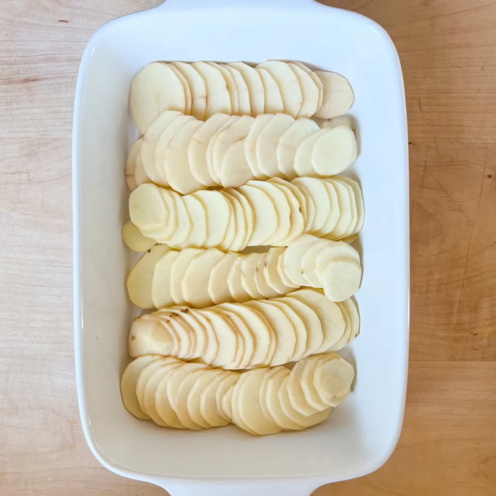 layering the potatoes