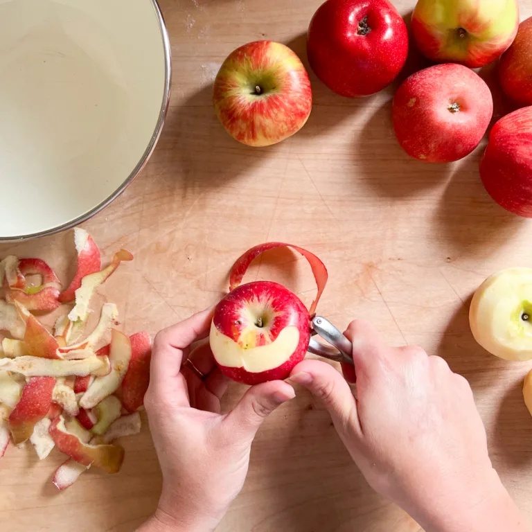 peeling apples for apple cobbler