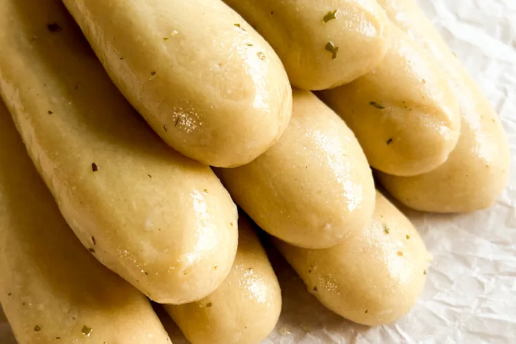 sourdough breadsticks brushed with butter