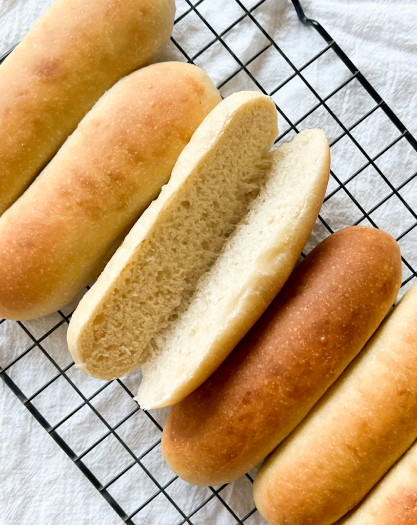 Sourdough hot dog buns cooling