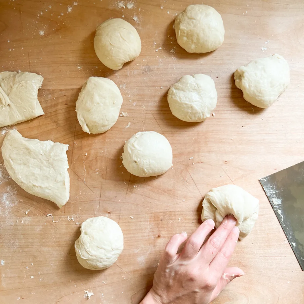 shaping the dough into balls.