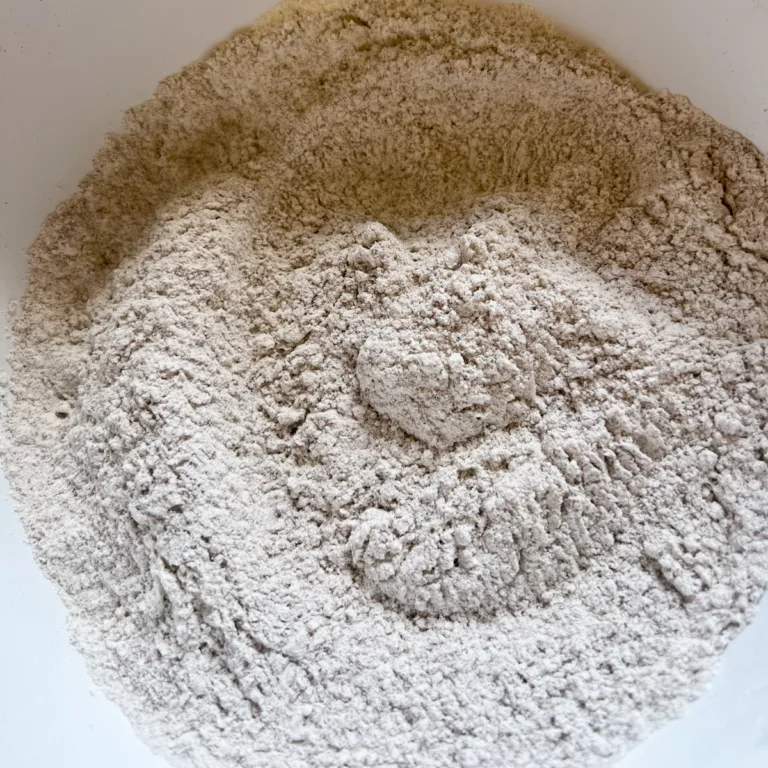 A bowl with the dry ingredients after they have been mixed.