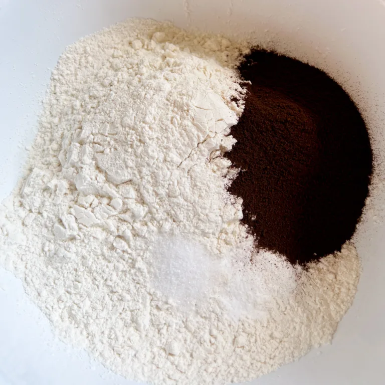 A bowl with the dry ingredients before they have been mixed.