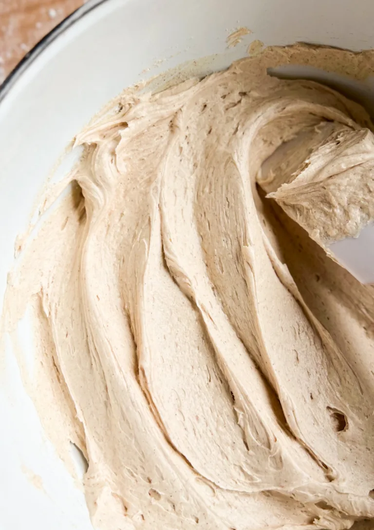 Cinnamon buttercream frosting in a bowl.