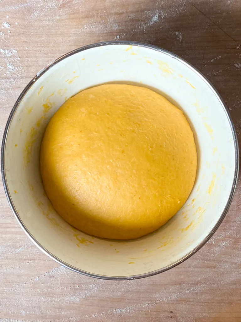 The pumpkin brioche dough after bulk fermentation.