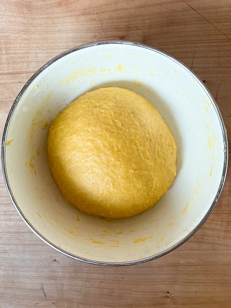 The pumpkin brioche dough before bulk fermentation.