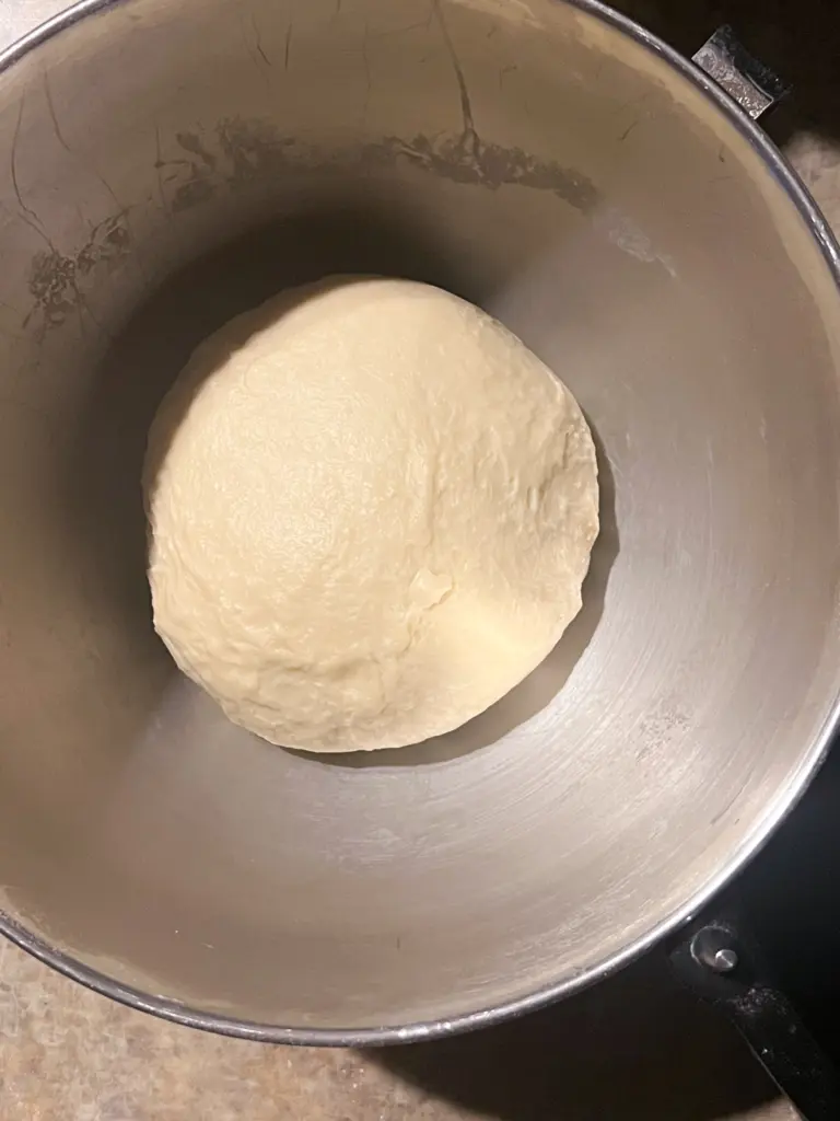 The crescent roll dough before bulk fermentation.